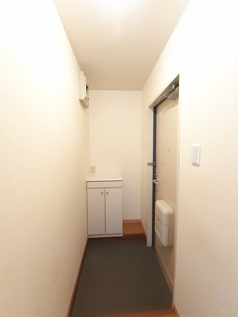プラドール田川 203 玄関