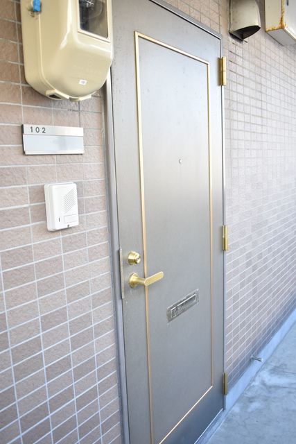 ベルオーク戸野目 102 玄関