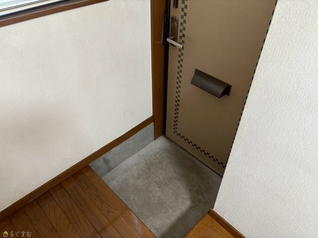 リバーサイドウィング 102 玄関
