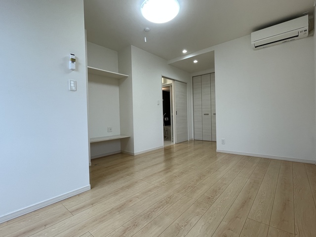Grand Maison KUZUTSUKA 105 リビング