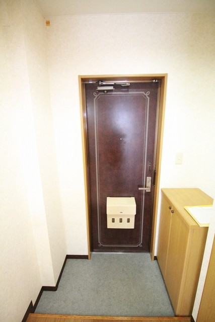 グローリー東明 111 玄関