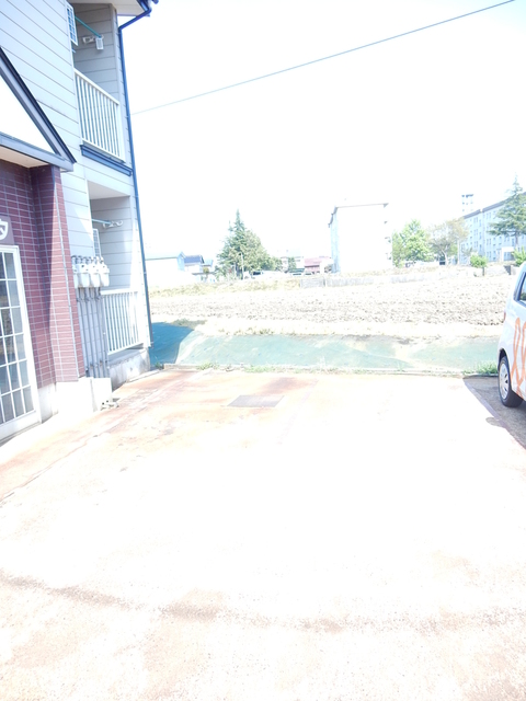 サンフェスタ 203 駐車場