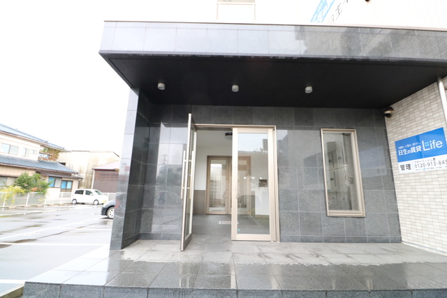 ホポロ大形本町 208 玄関