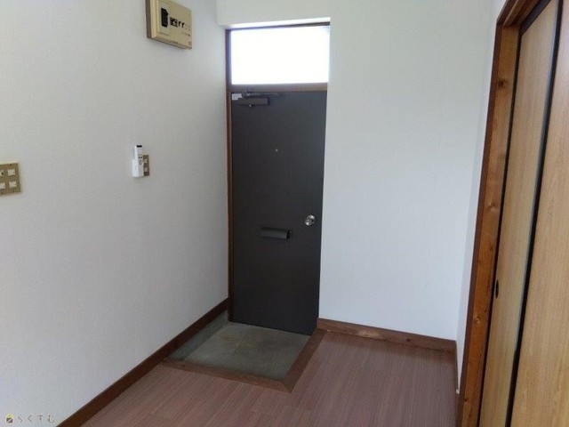 コティ 203 玄関