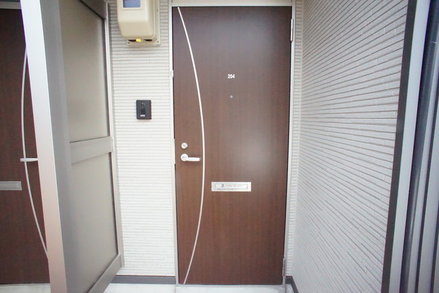 ミルズグランディール見附本町　Ｂ棟 101 玄関