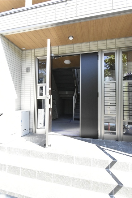 Ｄ-premier大学南 102 玄関