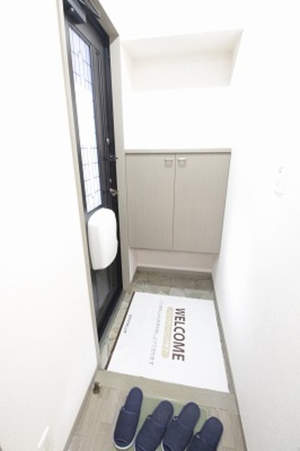 クレッセント荻川 102 玄関