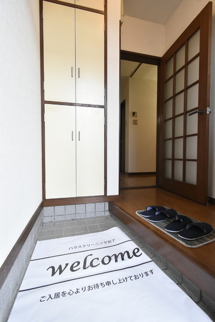 クリスタル女池　B 102 玄関