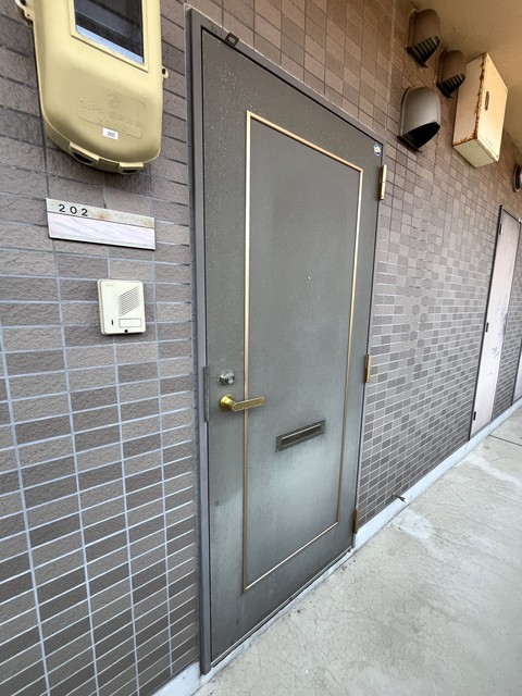 ベルオーク戸野目 102 玄関