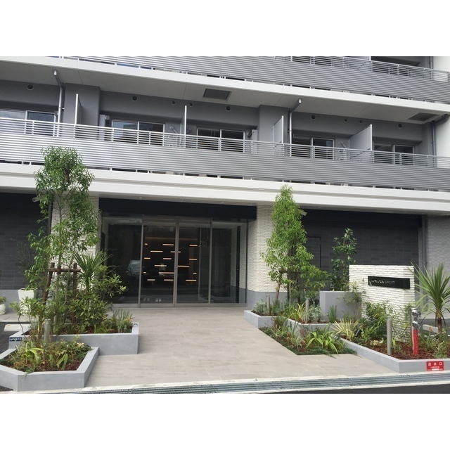 コンフォリア江坂広芝町 1007 玄関