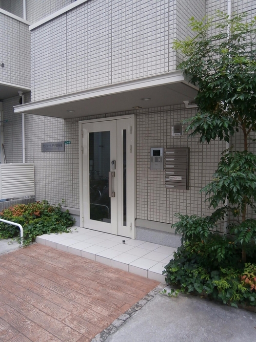 セジュール甲子園春風 302 玄関