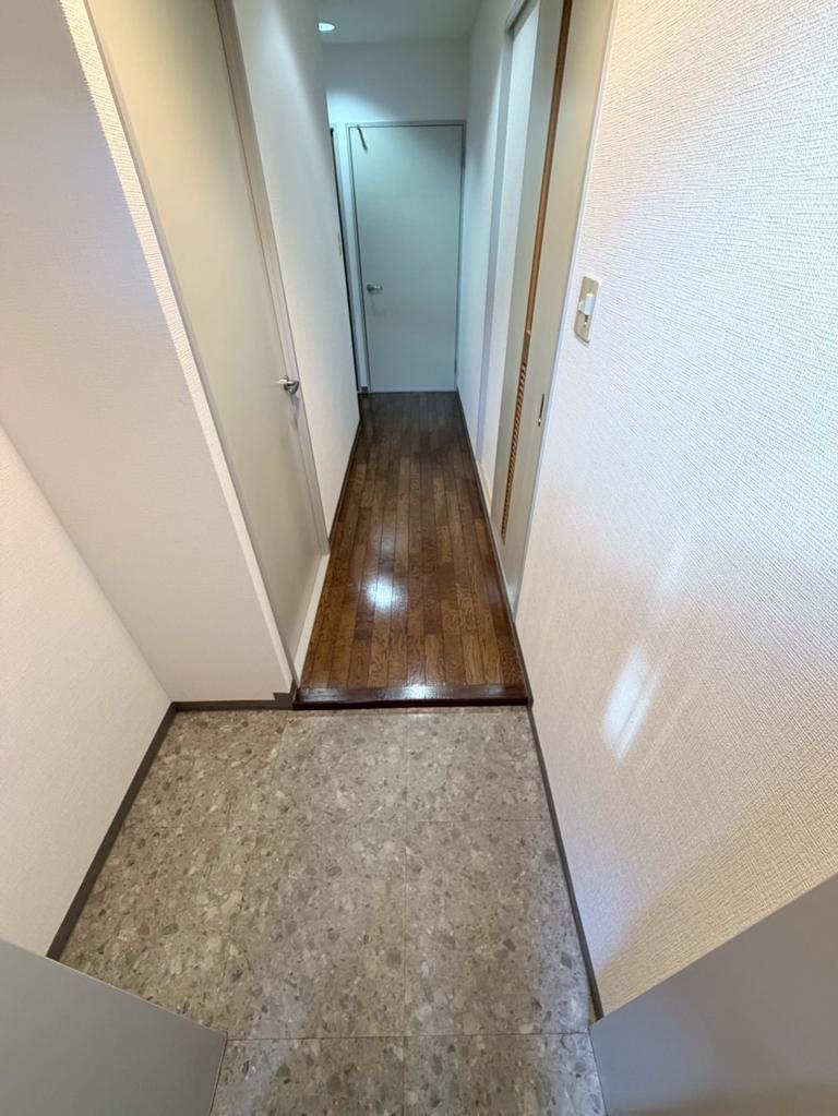 リュミエール鶴田 101 玄関